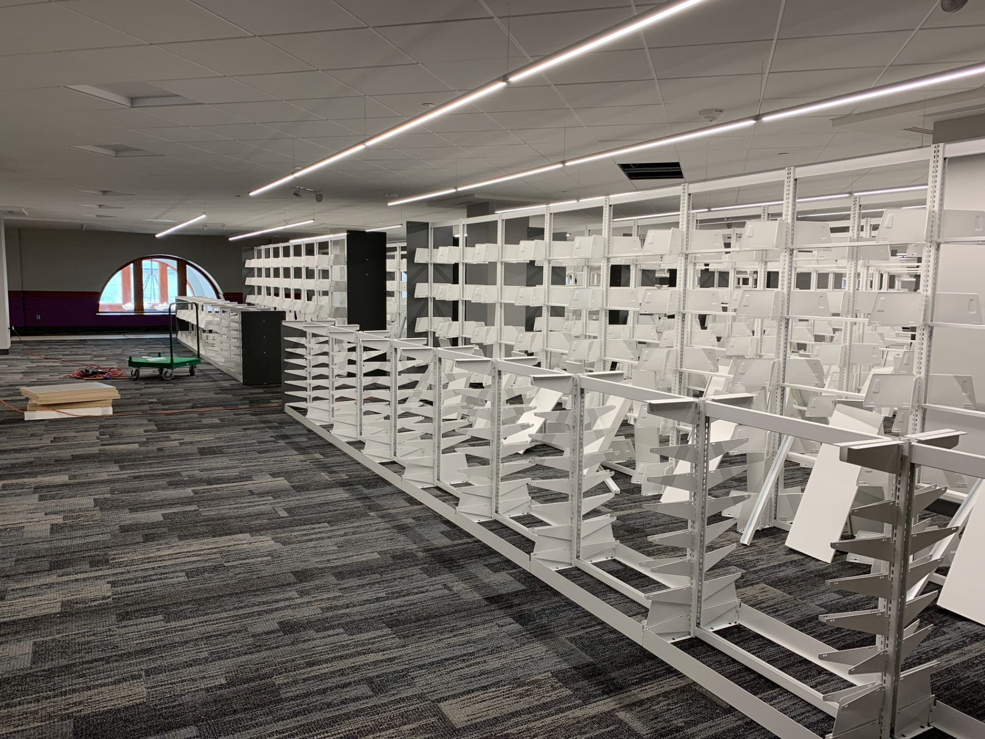 A picture of various shelving on the third floor.
