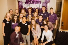 Anna with friends at a K-State event